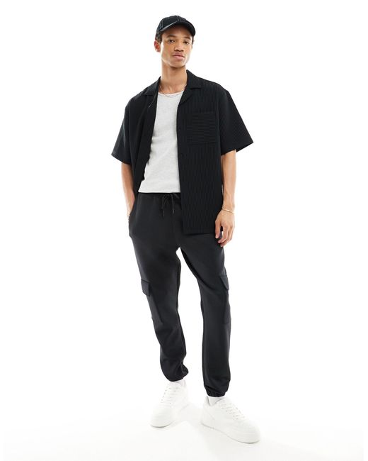 ASOS – eng geschnittene cargo-jogginghose in Black für Herren