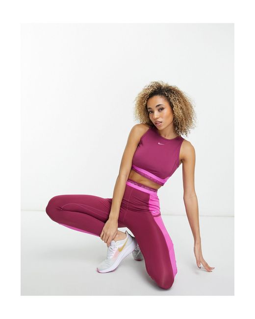 Nike Nike - Pro Femme - Training - Dri-fit - Sneldrogende Cropped Tanktop in het Pink