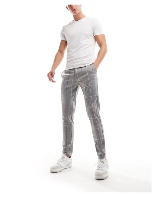 Intelligence - pantalon ajusté habillé en jersey à grands carreaux Jack & Jones pour homme en coloris Gray