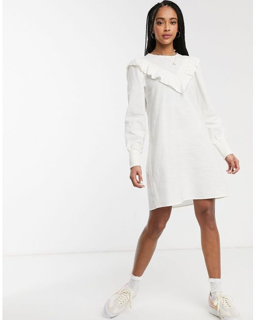 white ruffle smock dress