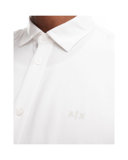 Armani Exchange White Logo Button Through Short Sleeve Boxy Fit Jersey Shirt for men