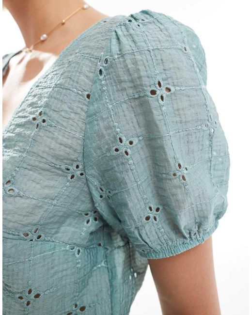 Blusa Corta Kaki Allacciata Sul Davanti Con Maniche A Sbuffo di Stradivarius in Blue
