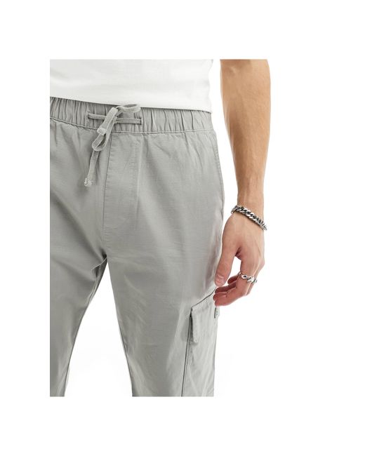 Pantalon cargo large en tissu résistant Bershka pour homme en coloris White