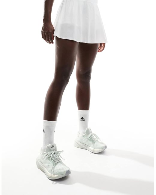 Adidas Originals White Adidas running – supernova stride – sneaker