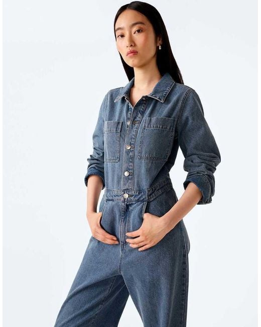 OMNES Blue Jumpsuits Diya Light Wash Denim Jumpsuit