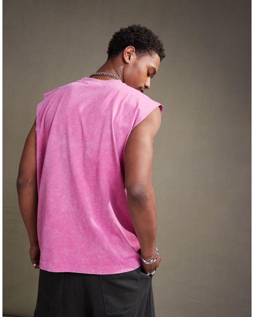 Camiseta rosa lavado unisex extragrande sin mangas con estampado ASOS de color Pink