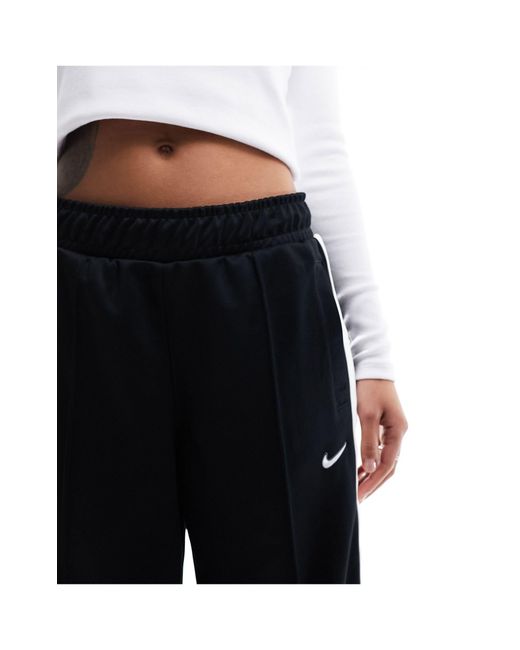 Streetwear - pantaloni cargo dritti neri di Nike in White