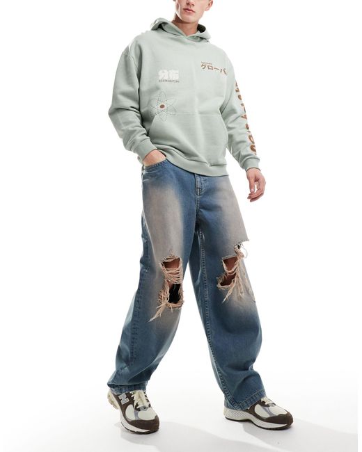 Jeans ampi lavaggio tinto con strappi sulle ginocchia di ASOS in Blue da Uomo