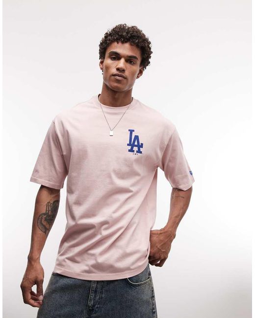 KTZ Pink La Dodgers Logo With Cap Back Graphic T-Shirt for men