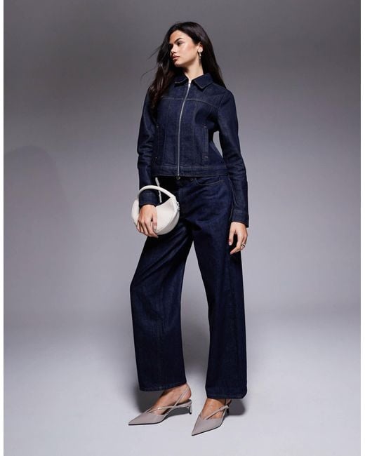 Veste en jean effet rétréci avec fermeture éclair - brut délavé ASOS en coloris Blue