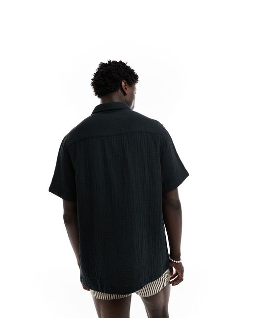Chemise décontractée texturée avec manches courtes et col à revers ASOS pour homme en coloris Black