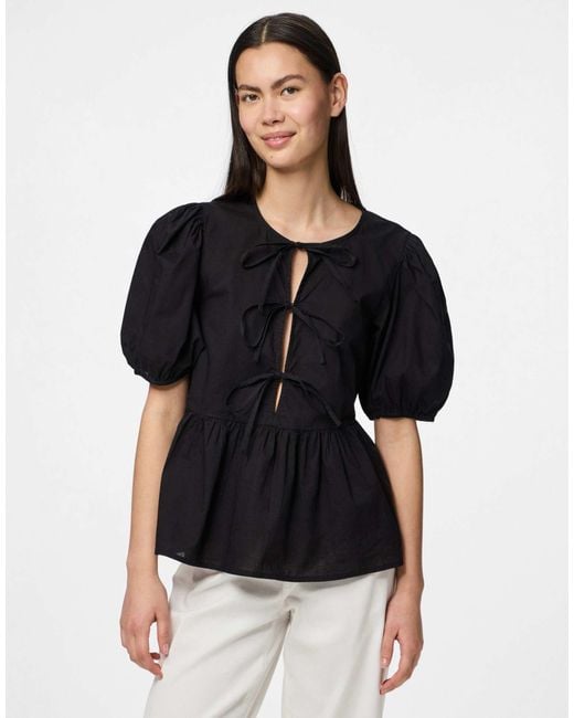 Top à manches bouffantes Pieces en coloris Black
