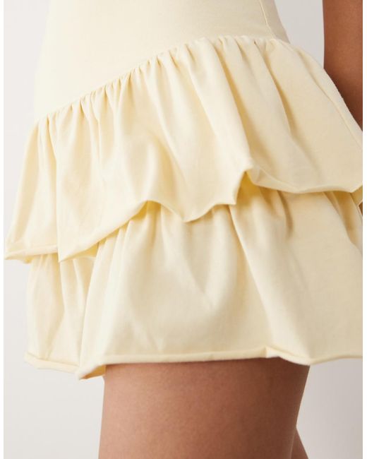 Fashionkilla Natural Exclusive Cotton Rich Sleeveless Drop Waist Ruffle Hem Mini Dress