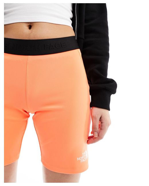 Pantalones cortos luminoso ajustados mountain athletic The North Face de color Orange