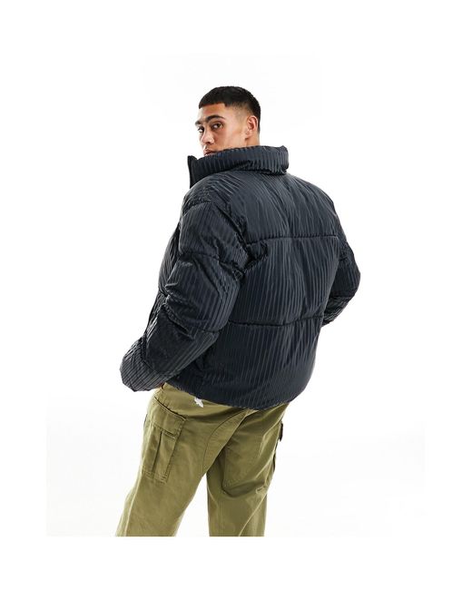 ADPT Blue Oversized Puffer With 3d Stripe for men
