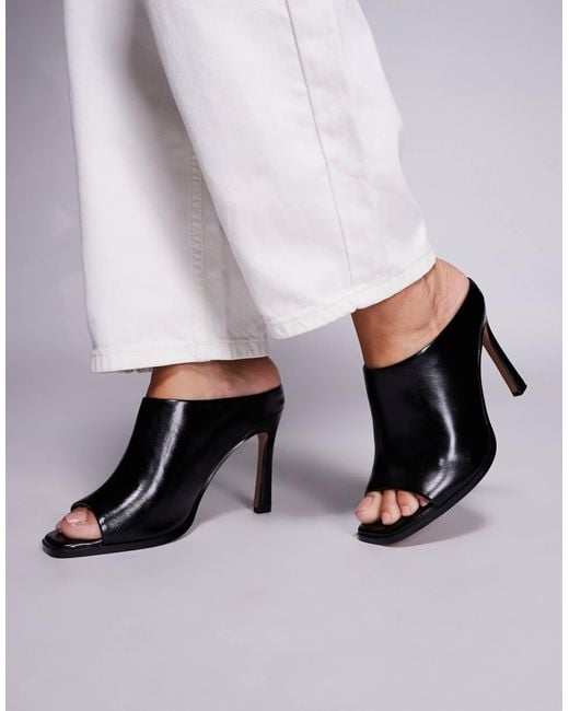 Nessa - mules à talon haut ASOS en coloris Black