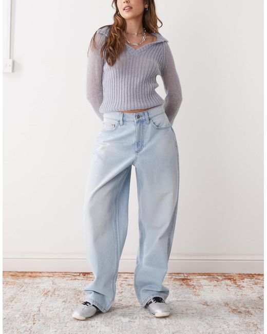 X014 - jean ample à taille mi-haute et délavage léger Collusion en coloris Blue