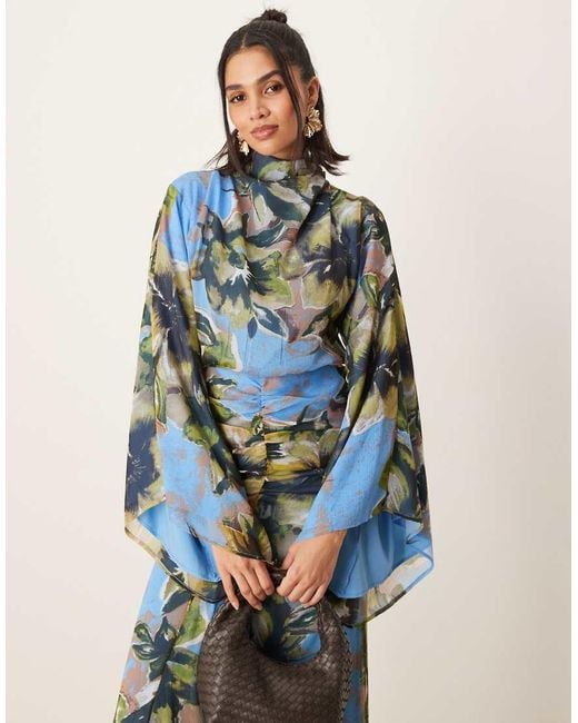 Vestido Largo Azul Con Estampado Floral, Mangas Voluminosas Y Falda Fruncida De ASOS de color Blue