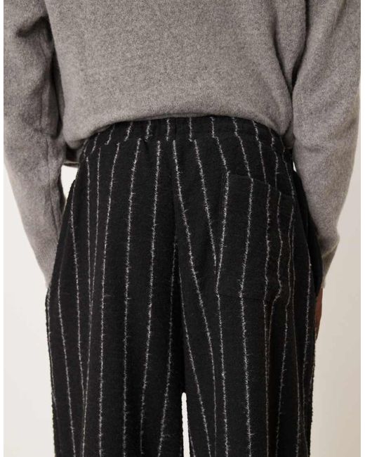 ASOS Black Loose joggers With Stripe for men