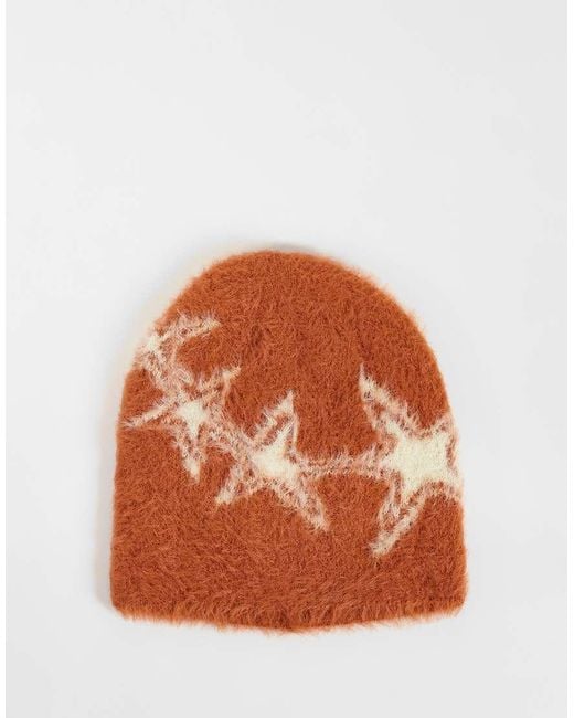Reclaimed Vintage Orange Unisex Skull Beanie With Star Print