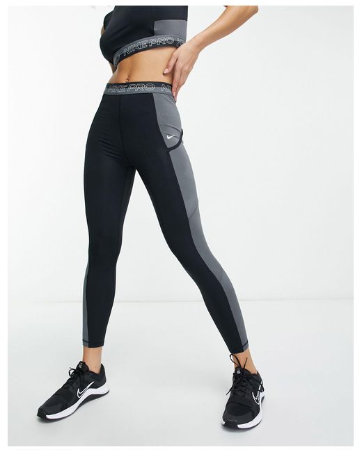 Nike Nike Pro Femme Training Dri Fit High Rise 7/8 leggings in Blue | Lyst