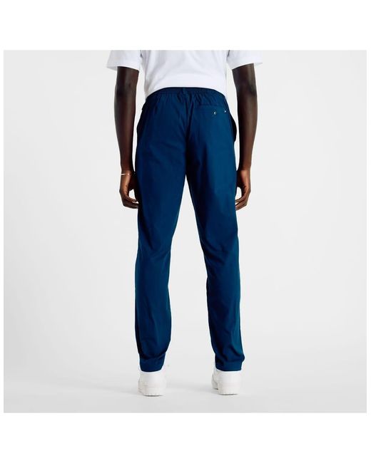 New Balance Blue Athletics Standard Tapered Pant 32" for men