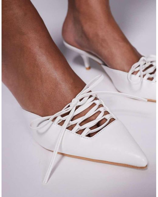 Geneva di Public Desire in White