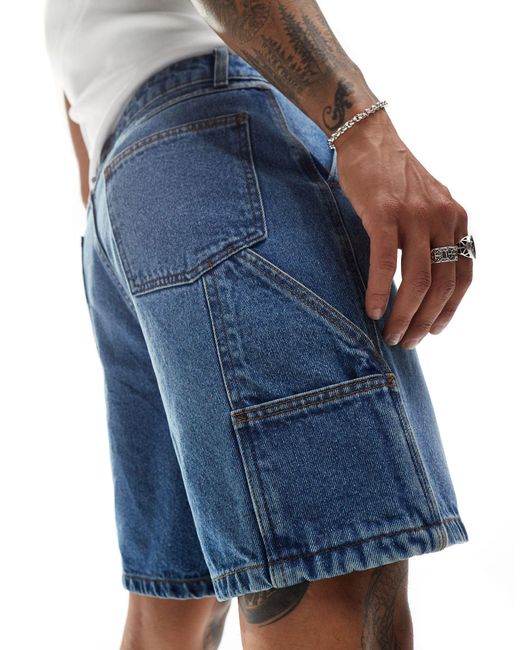 Short classique en jean à détails charpentier - moyen délavé ASOS pour homme en coloris Blue