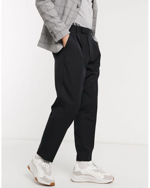 Pantaloni eleganti affusolati oversize neriASOS in Materiale sintetico da  Uomo colore Nero | Lyst