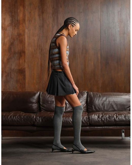 Monki Brown Pleated Mini Skirt With Frayed Edge And Pocket Detail