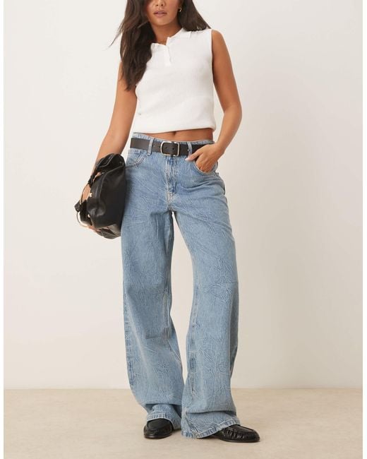 Jean baggy en coton texturé à taille basse - clair Mango en coloris Blue