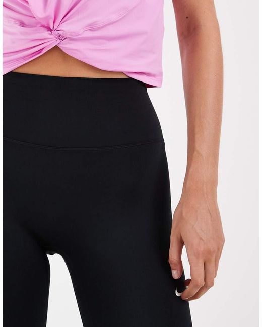 Leggings Con Estribo En Nike de color Pink
