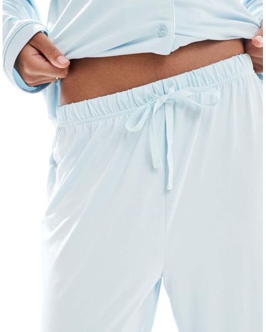 Loungeable Pyjamaset Van Superzachte Jersey Met Top Met Reverskraag En Broek Met Wijde Pijpen En Biezen in het Blue