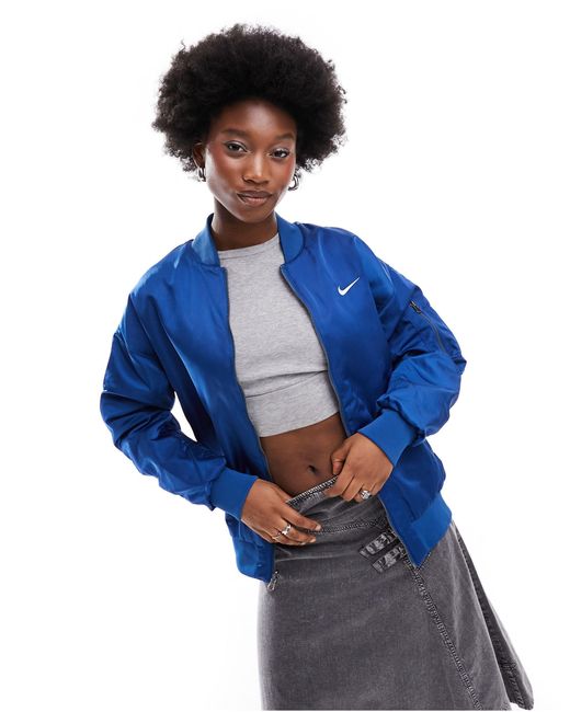 Bomber réversible style universitaire Nike en coloris Blue