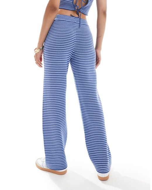 Asos design petite - pantalon ample d'ensemble en maille à rayures - marine et ASOS en coloris Blue