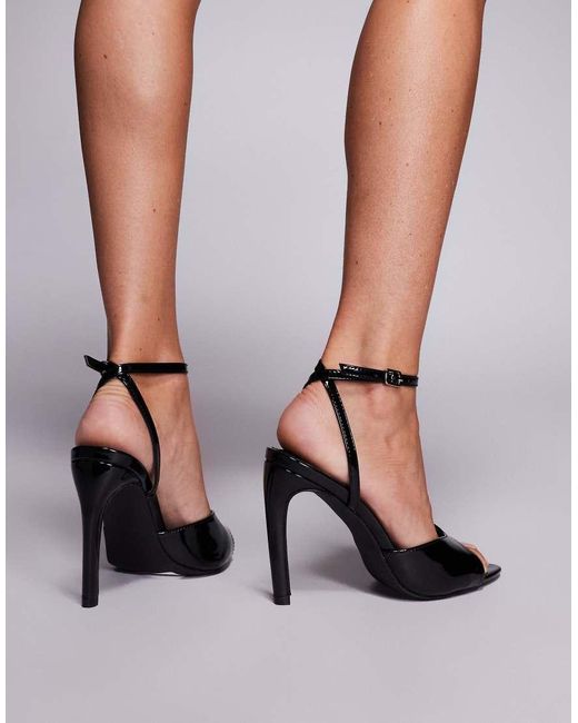 Sandalias Negras De Tacón Con Diseño Anudado A La Pierna Caught On De Public Desire de color Black