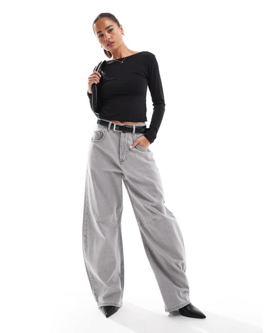 Top manches longues à encolure bateau et dos ouvert Stradivarius en coloris Black