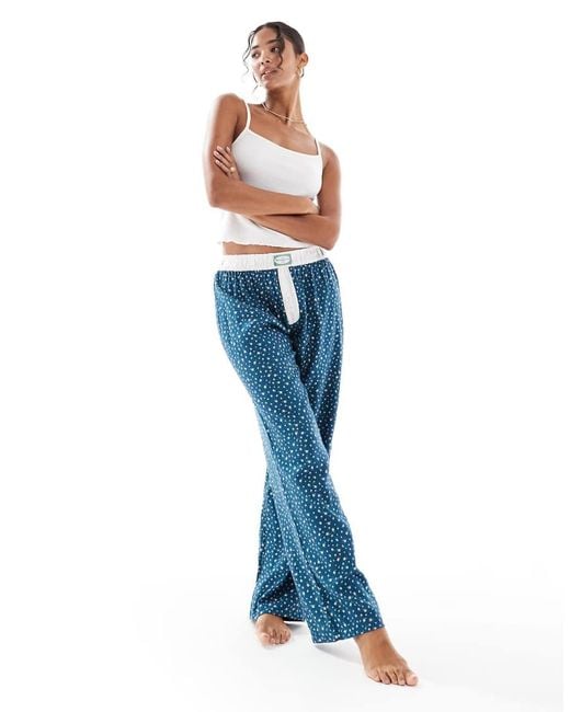 Pantalones De Pijama De Pernera Ancha Con Estampado De Florecitas De Franela De Cotton On-Azul Marino Cotton On de color Blue