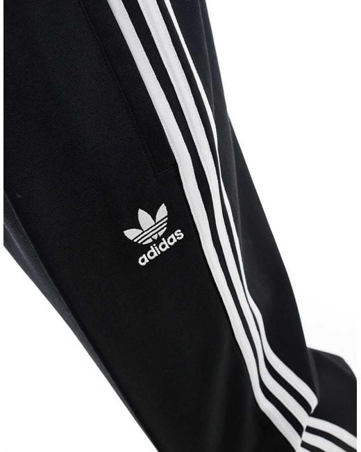 Adidas Originals Black Firebird Loose Track Pants for men