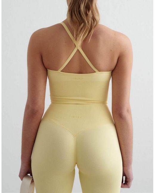 Bralette Amarillo Suave Moldeador Sin Costuras Con Tiras Cruzadas En La Espalda Shape De Aim'n de color Green