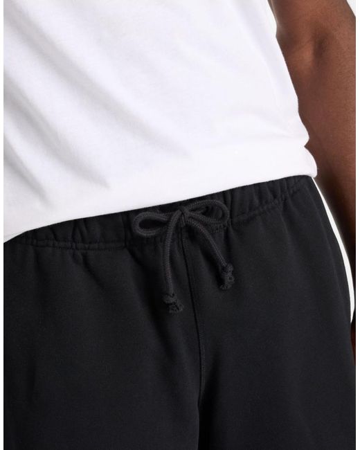 New Balance Black Athletics French Terry Short 5" for men