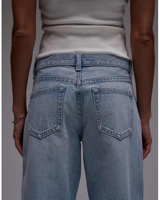 Vaqueros Descoloridos De Talle Bajo Y Pernera Ancha Ember De -Azul TOPSHOP de color Gray