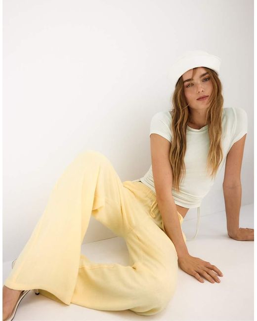 Stradivarius Yellow Flowy Linen-look Trousers