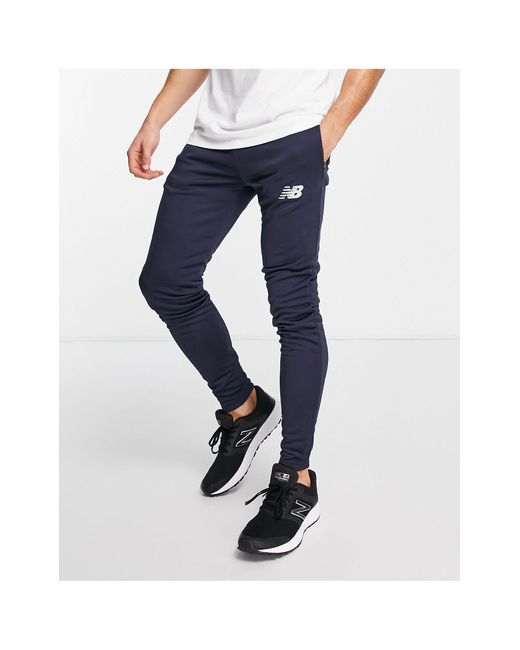 New Balance Voetbal - Gebreide Slim Fit joggingbroek in het Zwart voor heren  - Lyst