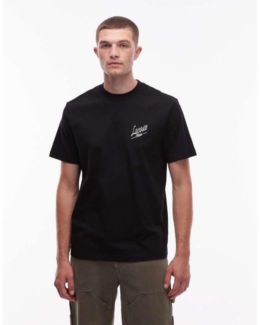 T-Shirt Nera Con Stampa Sul Retro di Lacoste in Black da Uomo