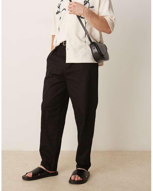 Pantalones Negros De Corte Carrot Con Pinzas De Tejido Efecto Lino De ASOS de hombre de color Natural