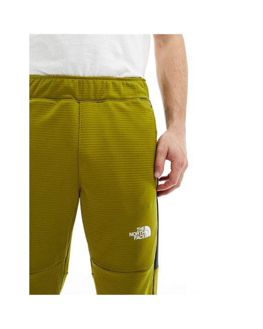The North Face Training – mountain athletics – fleece-jogginghose in Green für Herren