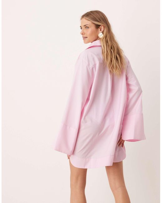 Robe chemise courte à rayures avec revers larges et poches oversize - bonbon ASOS en coloris Pink