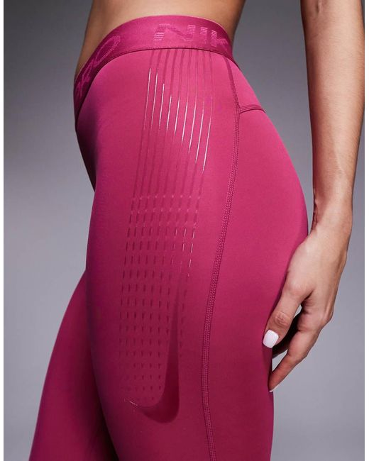 Nike Pink Nike Pro Training 365 Mid Rise leggings