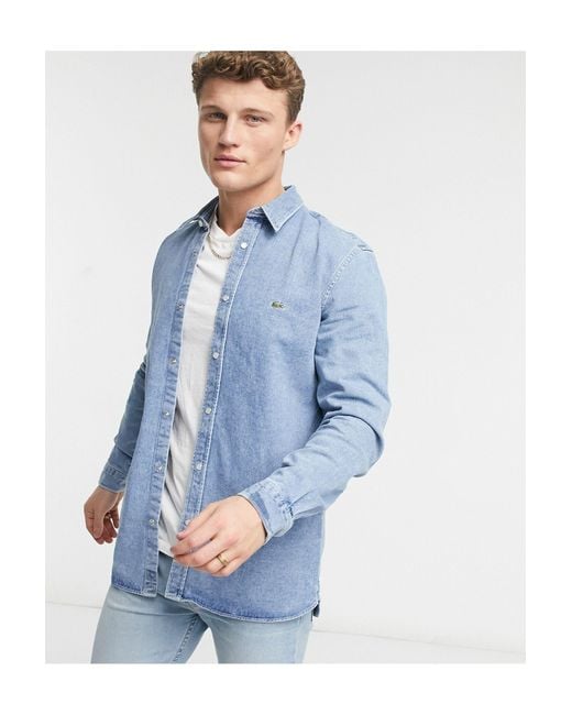 Lacoste – Jeanshemd mit Druckknöpfen in Blue für Herren